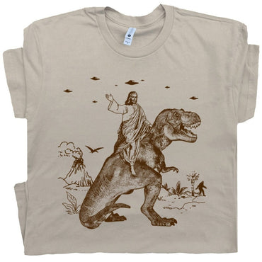 Jesus Riding Dinosaur T Shirt UFO Funny Jesus T Shirts Offensive Cool Graphic Shirts - Msix Apparel - Sand Color T Shirt