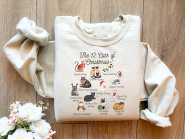 The 12 Cats of Christmas Sweatshirt,Cute Christmas Cats Shirt, Christmas Cat Mom Shirt, Xmas Cats,Cat Lover Christmas Sweater,Cat Owner Gift - Msix Apparel - Sand Color Sweatshirt